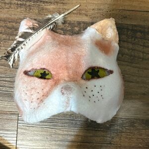 Cat with burnt ear therian mask! 🐾